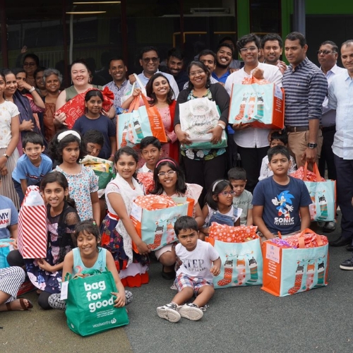 A photo of the Sunday School group, and their families, from the Glorious Life Church in Salisbury. The children from Sunday School had each lovingly and thoughtfully packaged up food parcels and gifts